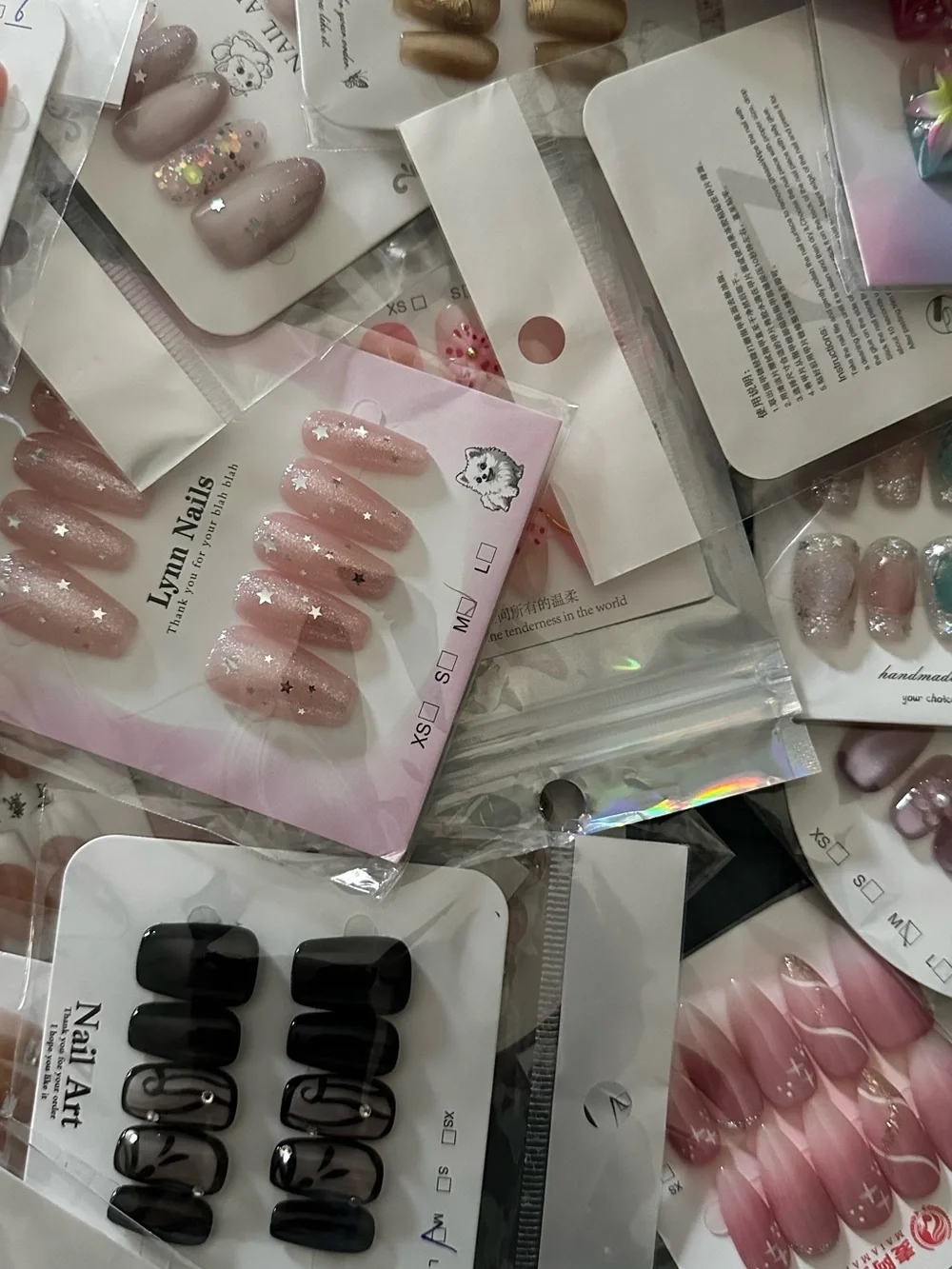 100 Sets of SURPRISE Assorted Press-On Nail Sets - Floral, Pink, Blue, Neutral